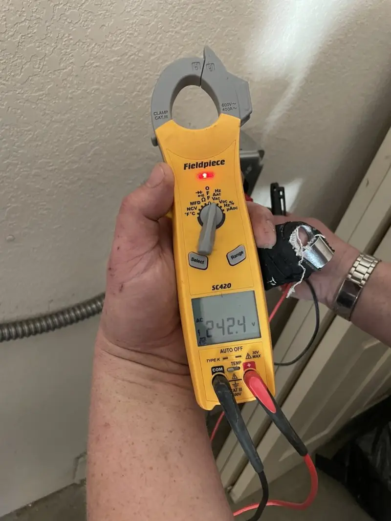 Voltage testing with clamp meter during Generator Installation in Newbury